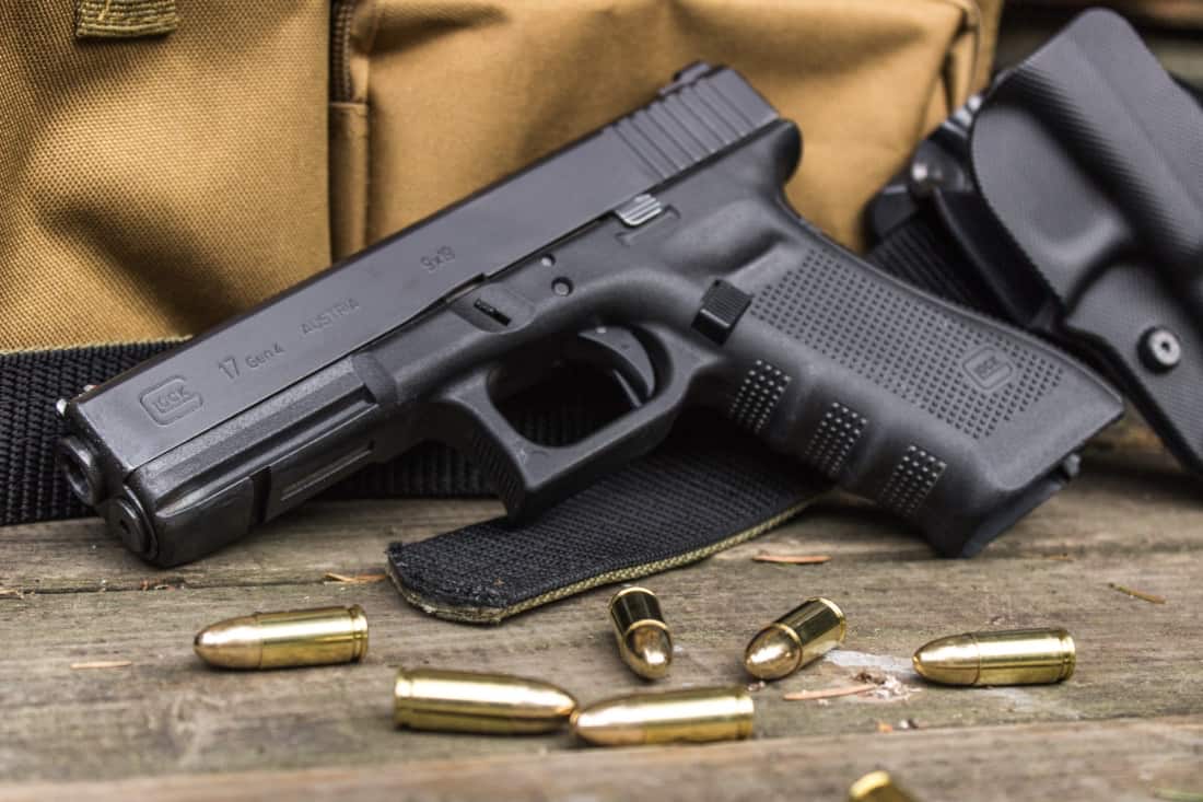 handgun with bag and ammo close-up2